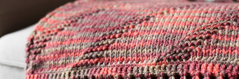 Fringed throw